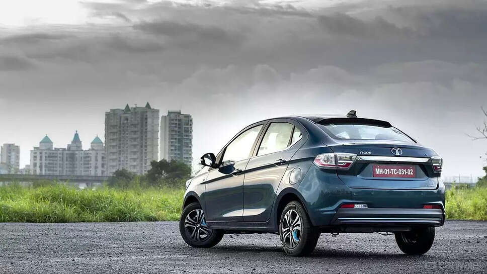 https://www.carwale.com/tata-cars/tiago-ev/images/tata-tiago-ev-left-rear-three-quarter11-405641/